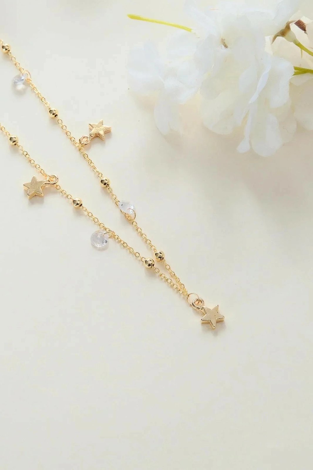 Varëse qafe Jumeon, ngjyrë ari, me gurë zirkon, Gld-Yldzrknkl