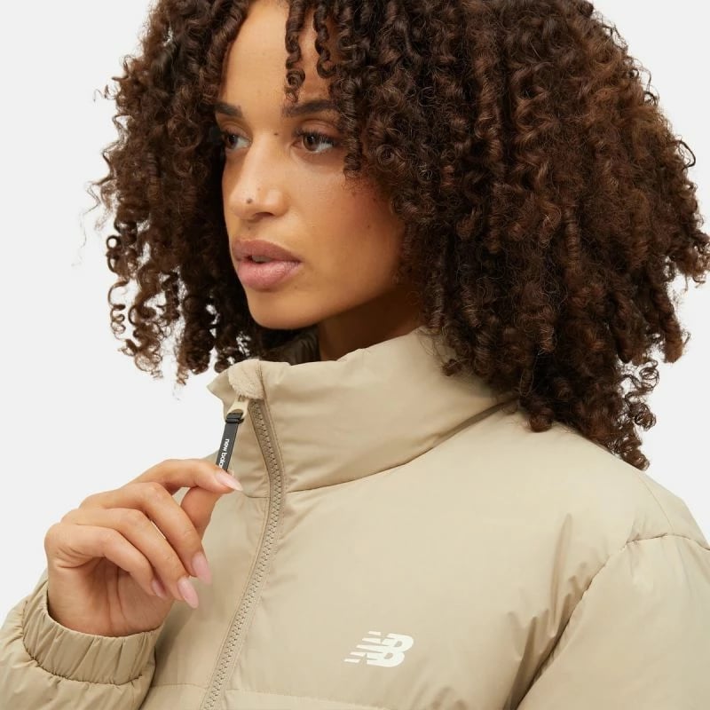 Jakne New Balance femra, bezhë