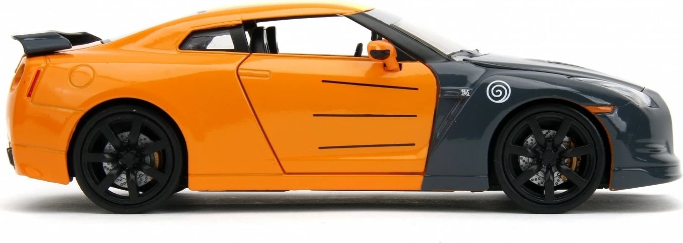 Makine lodër Jada Toys Naruto Shippuden Nissan GT-R 1:24 me figurë Naruto, portokalli/zezë Makine lodër Jada Toys Naruto Shippuden Nissan GT-R 1:24 me figurë Naruto, portokalli/zezë
