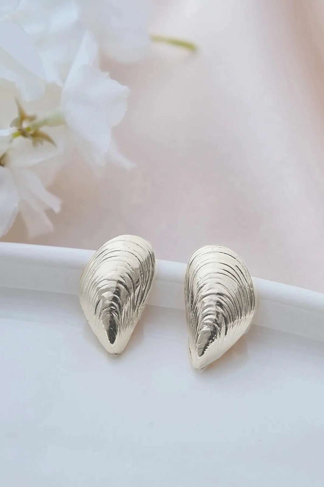 Vathë argjendi Jumeon, Gms-Dnzyldkp