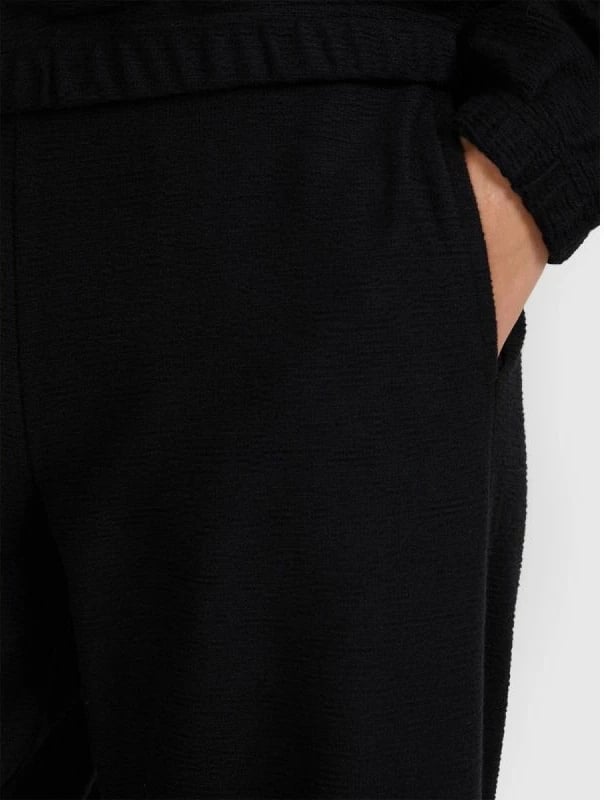 Pantallona sportive për femra 4F