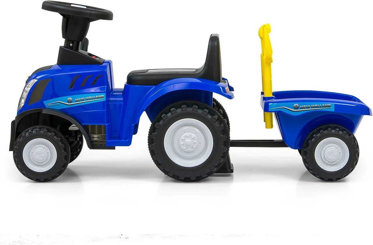 Traktor ride-on Milly Mally New Holland T7 3901, timon interaktiv me tinguj/drita, moshë 12-36 muaj, kërkon 2x AA (pa bateri), blu, set me rimorkio + lopatë/grep