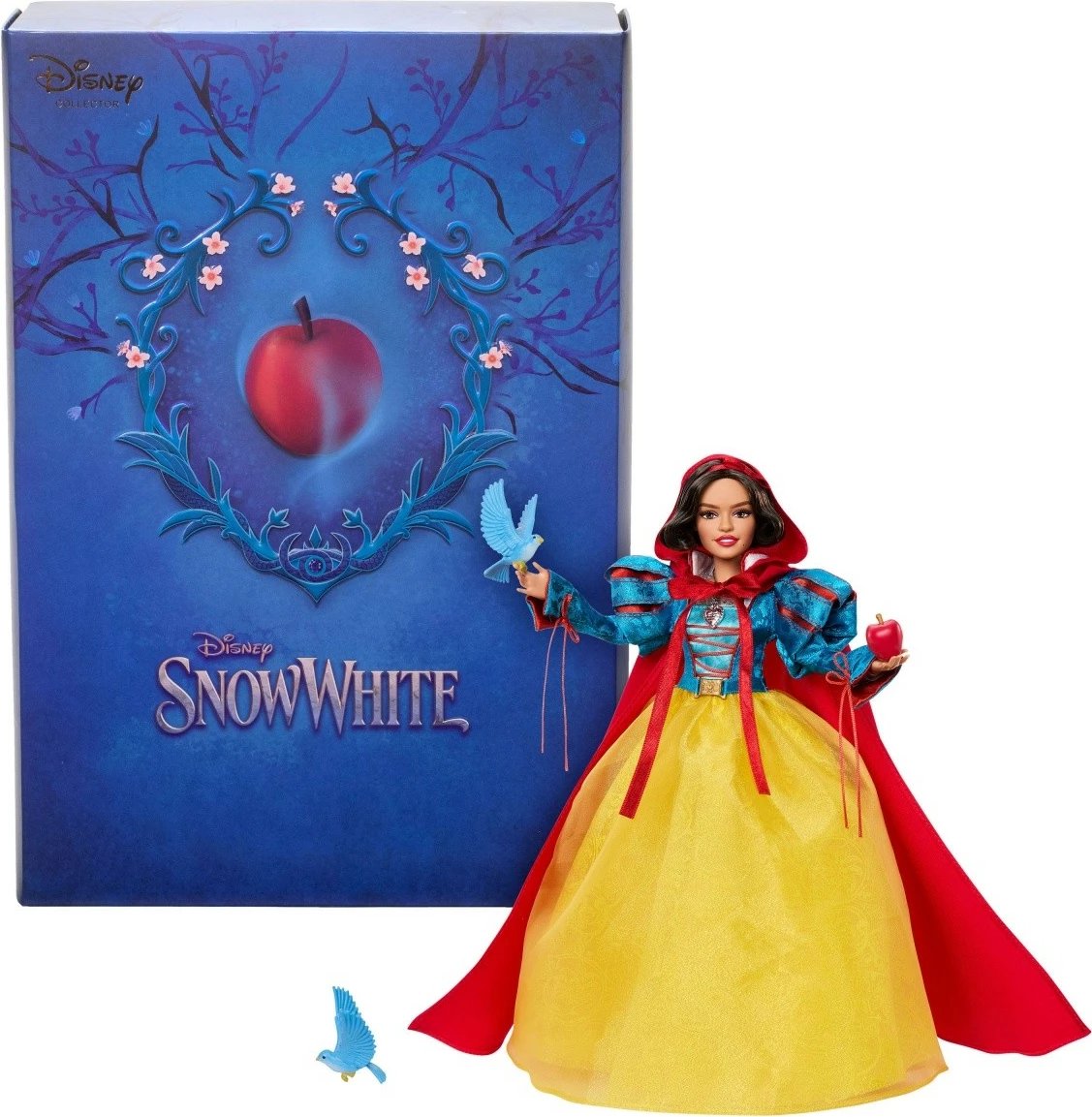Kukull koleksionuese Mattel Disney Snow White HVY53 me fustan të verdhë, pelerinë të kuqe dhe aksesorë