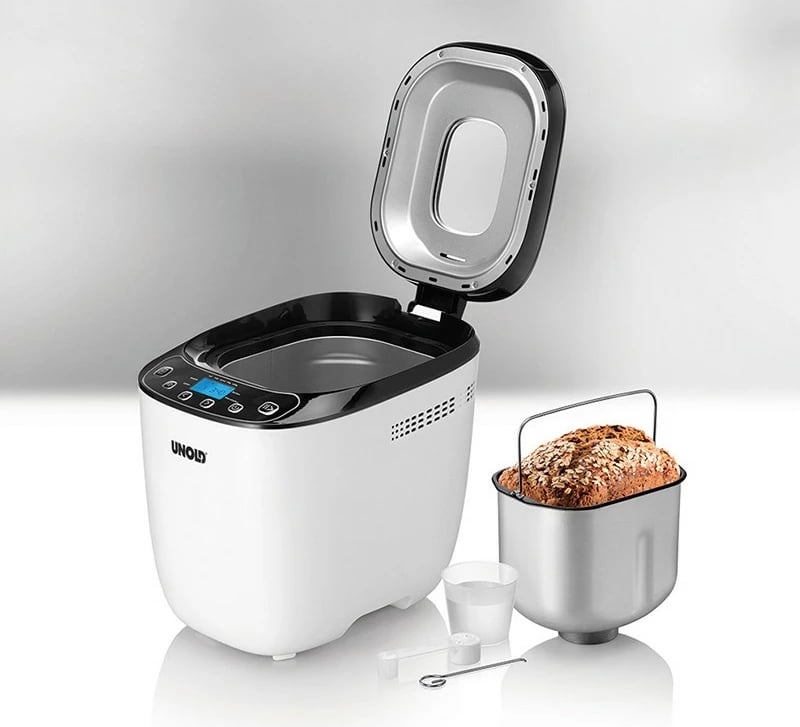 Makineri buke UNOLD 68010, 1 kg, timer i programueshëm, kontroll i thekjes, funksion mbajtje ngrohtë, dritare shikimi, e bardhë