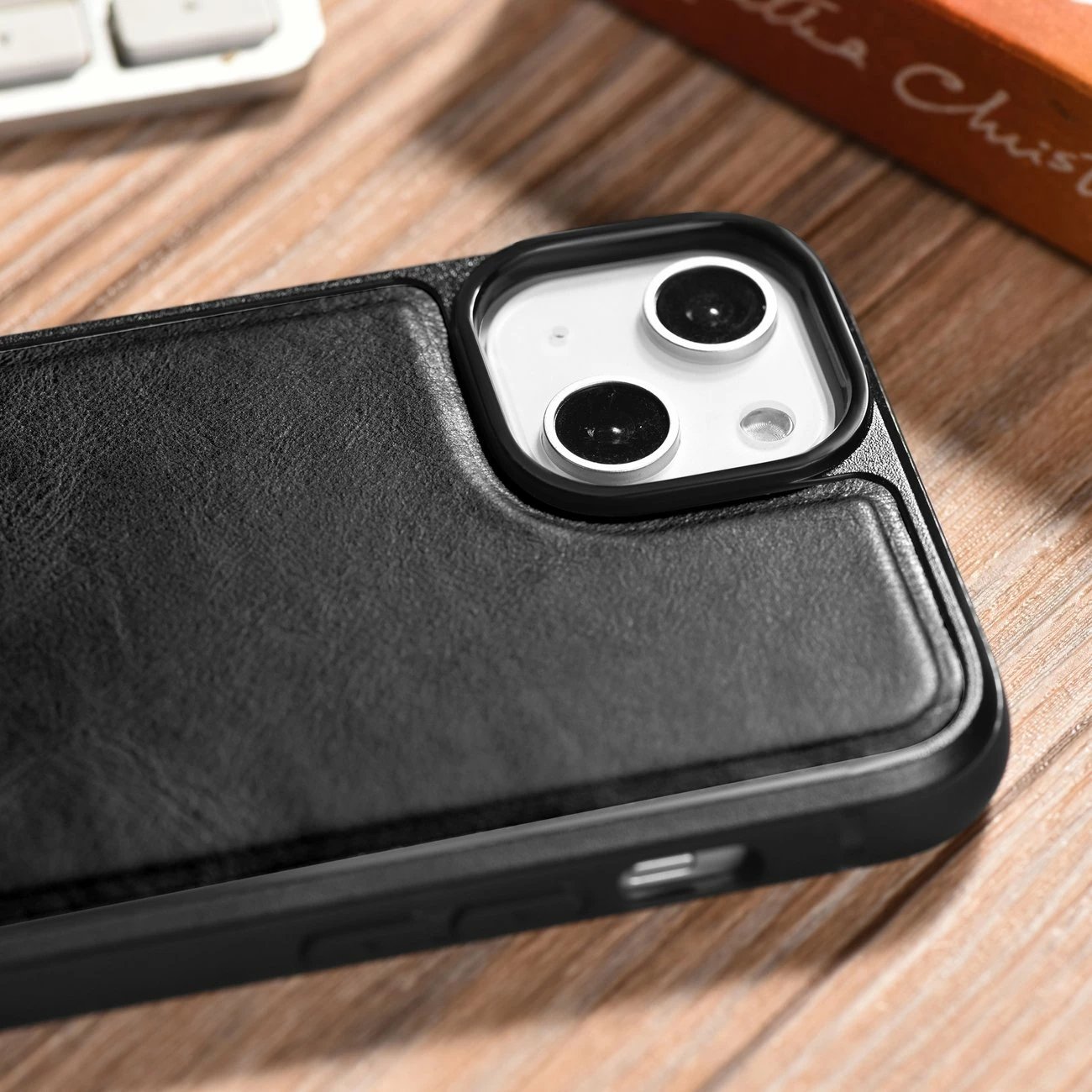 Mbështjellës iCarer për iPhone 14 Plus, lëkurë natyrale, e zezë