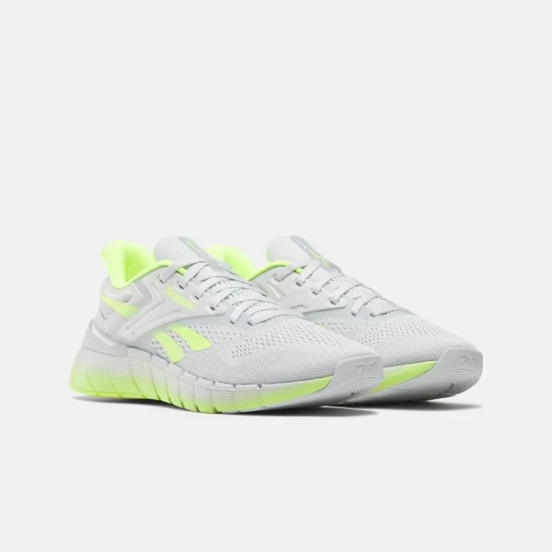 Atlete për meshkuj Reebok, të bardha dhe të verdha