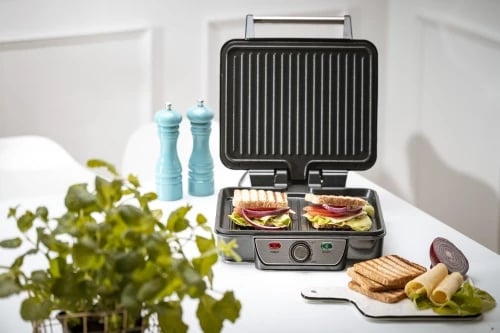 Grill elektrik kontakt 2-në-1, Mesko MS 3050, 2500W max, pllaka 28x23 cm, hapje 180°, kontroll temperature, veshje jo‑ngjitëse, me tabakë piku dhe spatulë