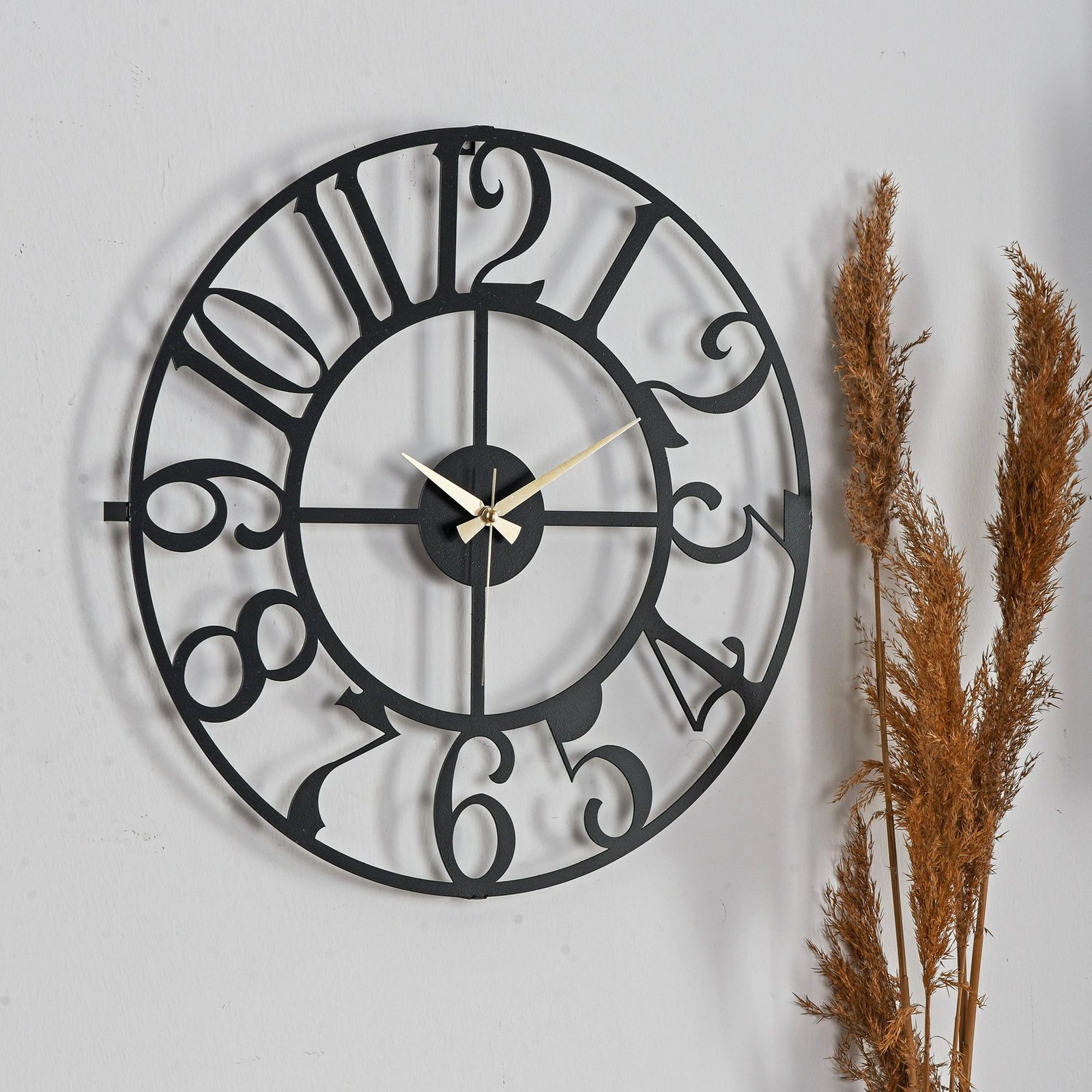 Orë muri dekorative prej metali, Wallity Bonni, e zezë, 50x50cm