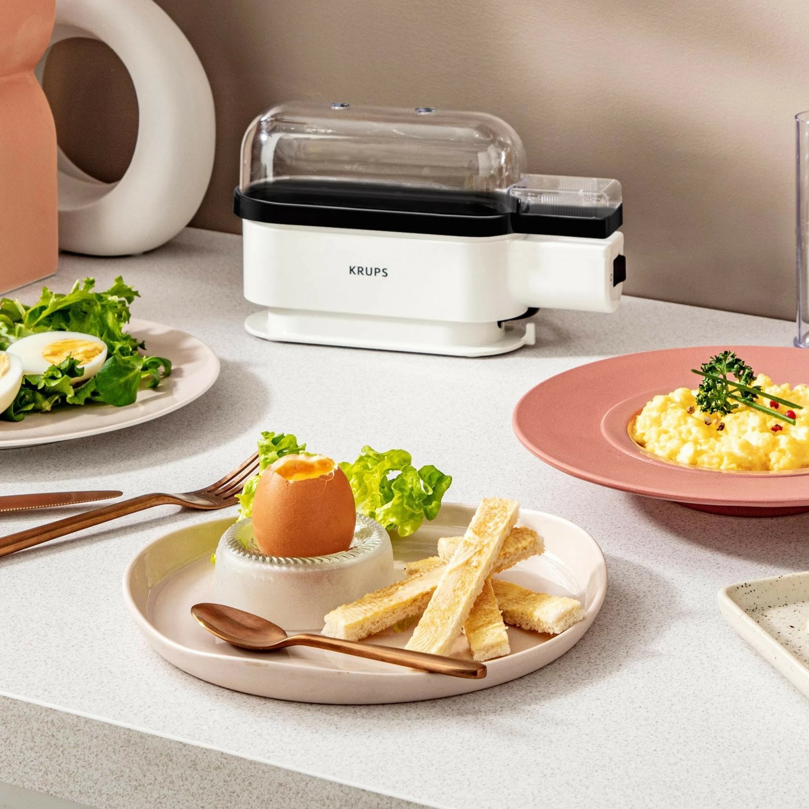 Aparat për zierje vezësh Krups EG 234115 Ovomat Trio, 300W, zi/bardhë