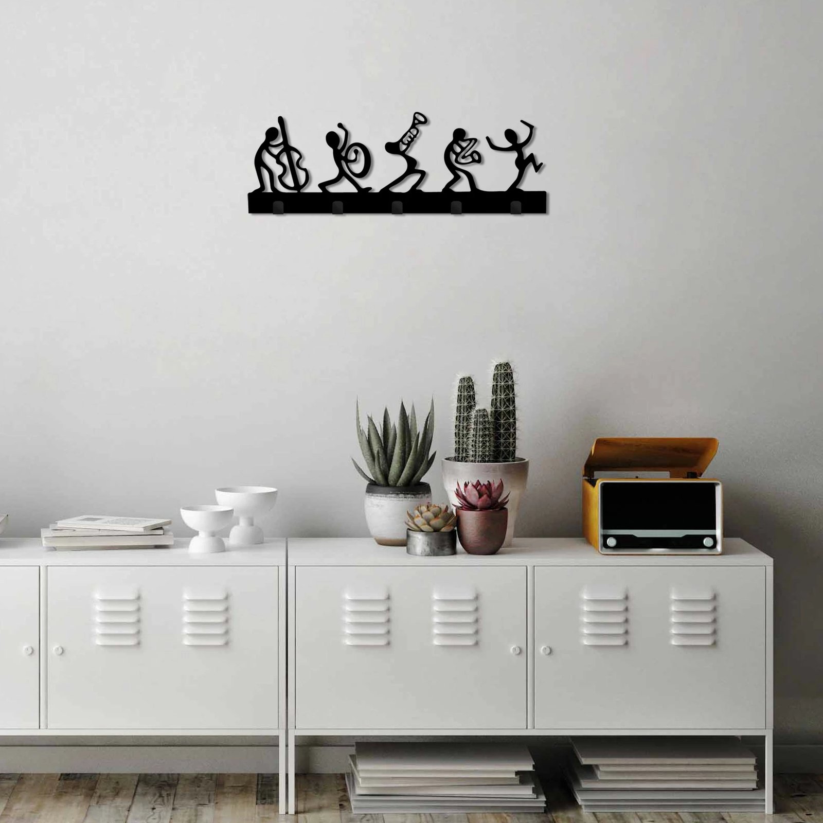 Varëse muri prej metali, motiv bendi muzikor, Wallity, e zezë