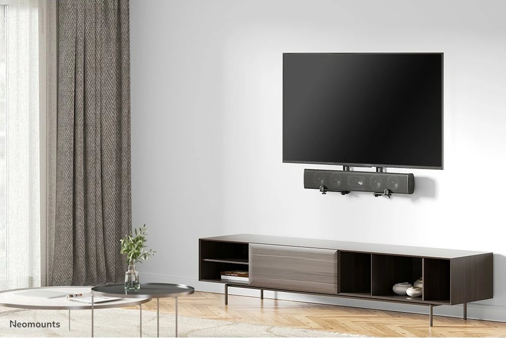 Mbajtës universal videobar/soundbar Neomounts AWL29-650BL1, çelik, 15 kg, i zi
