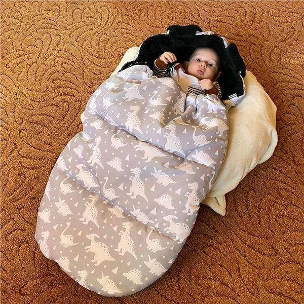 Thes gjumi për bebe, New Baby, Elephants Luxury, fleece, 112x54 cm, me vrima për rripa 5-pikësh, mbyllje me zinxhir, turkeze