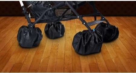 Mbrojtëse rrotash karroce CARETERO Universal Ø25 cm set 4 copë, e zezë