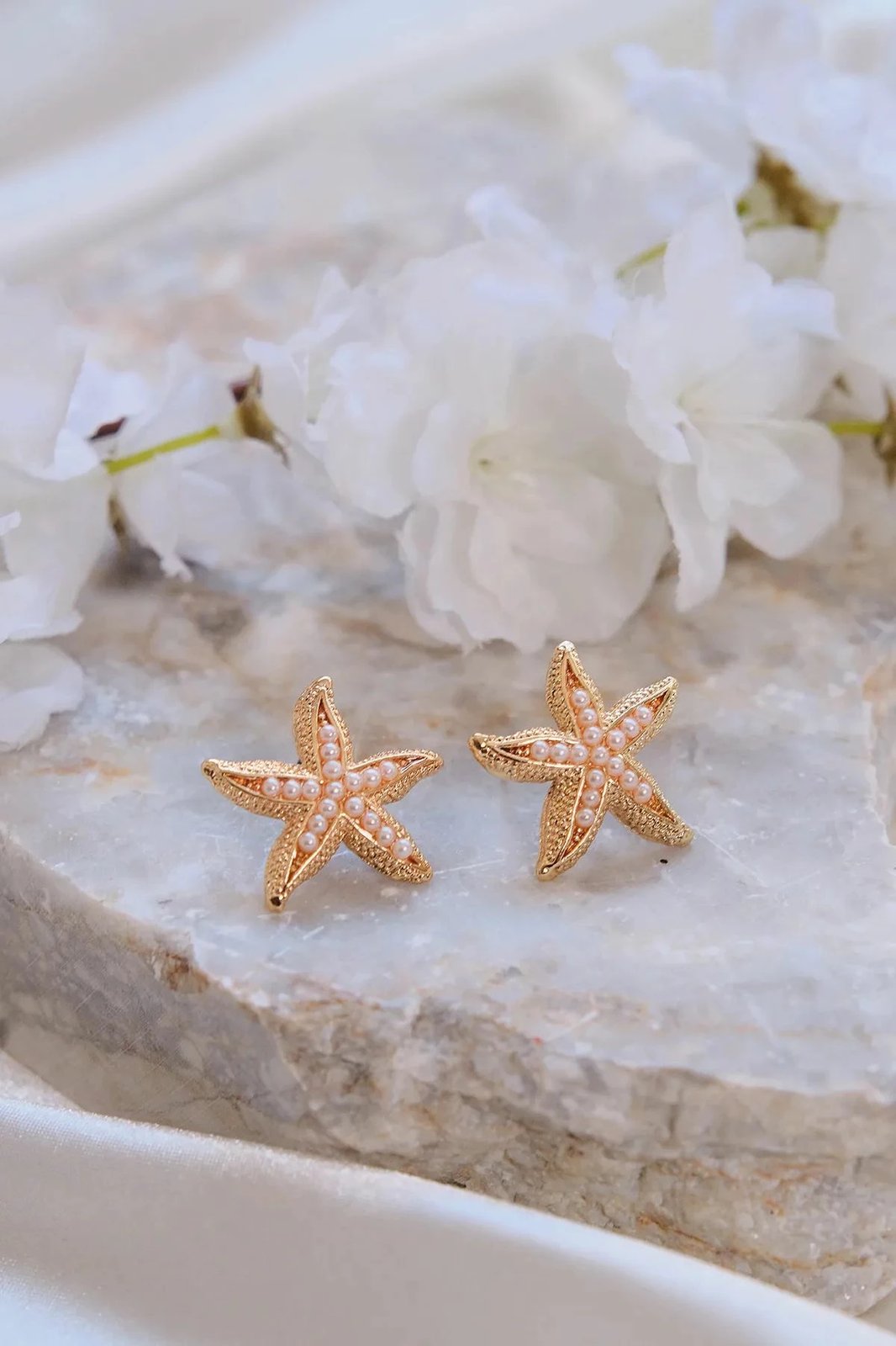 Vathë Jumeon, ngjyrë ari, formë ylli deti