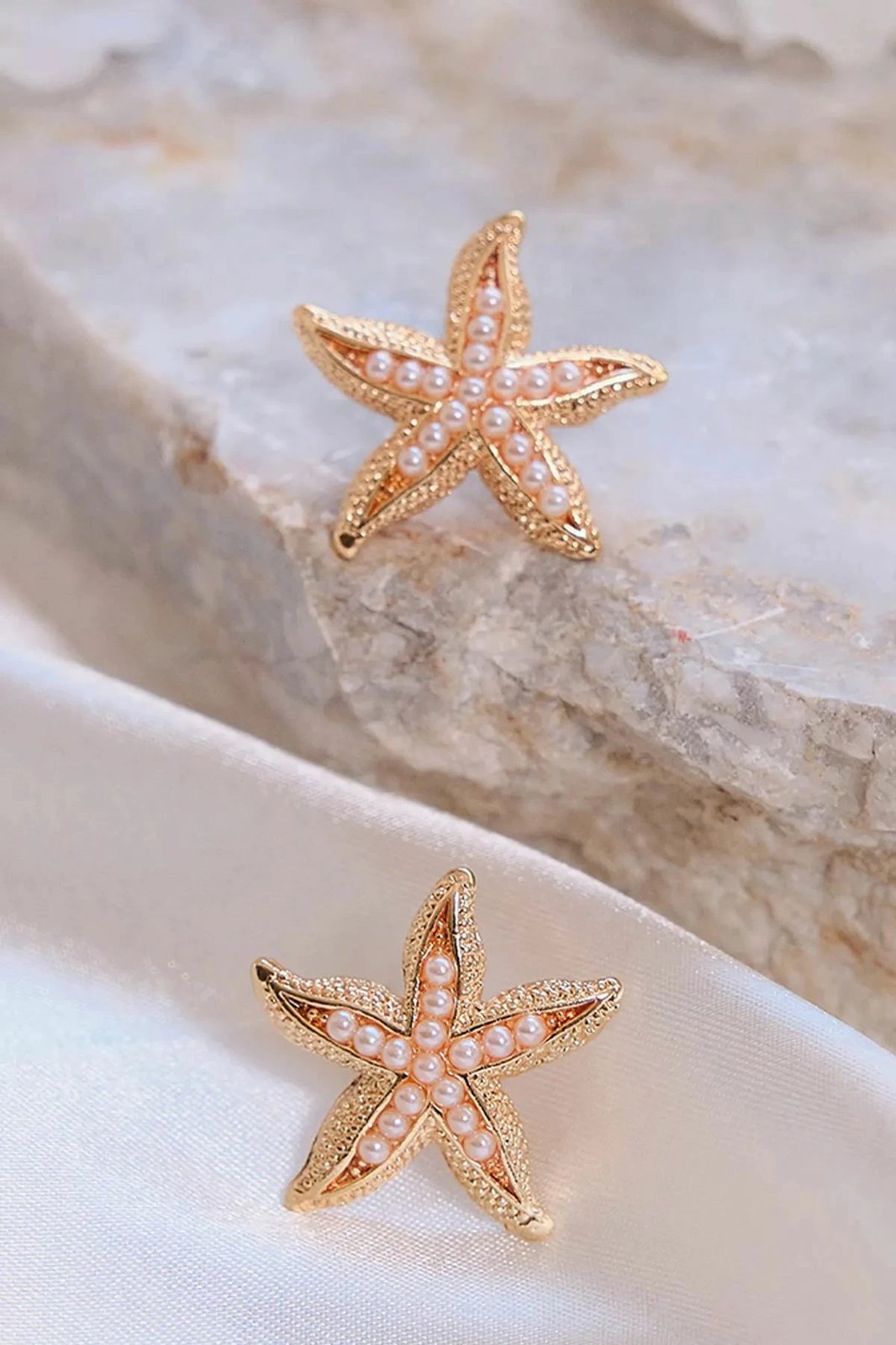 Vathë Jumeon, ngjyrë ari, formë ylli deti