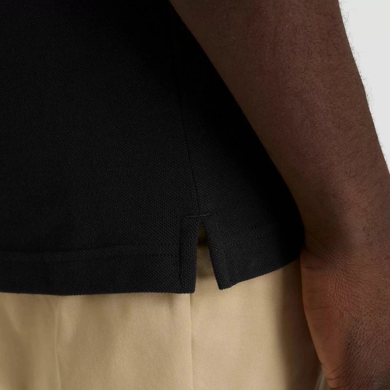 Maicë polo për meshkuj New Balance, e zezë
