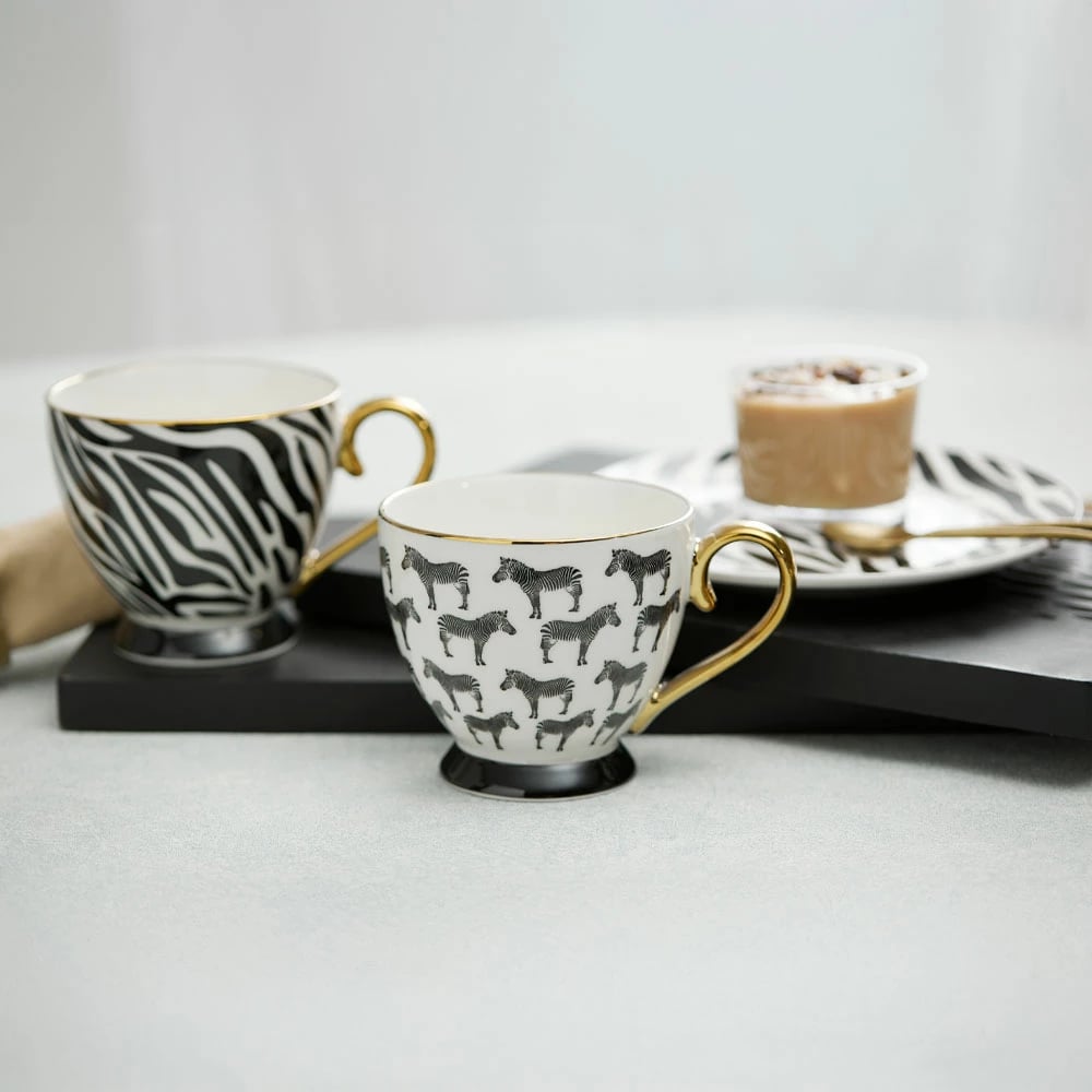 Filxhan Safari, porcelan New Bone China, i bardhë, detaje të zeza e të arta, 11x11x9cm Filxhan Safari, porcelan New Bone China, i bardhë, detaje të zeza e të arta, 11x11x9cm