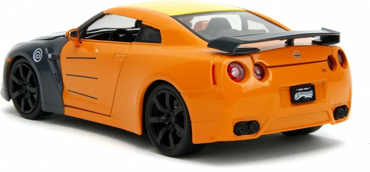 Makine lodër Jada Toys Naruto Shippuden Nissan GT-R 1:24 me figurë Naruto, portokalli/zezë Makine lodër Jada Toys Naruto Shippuden Nissan GT-R 1:24 me figurë Naruto, portokalli/zezë