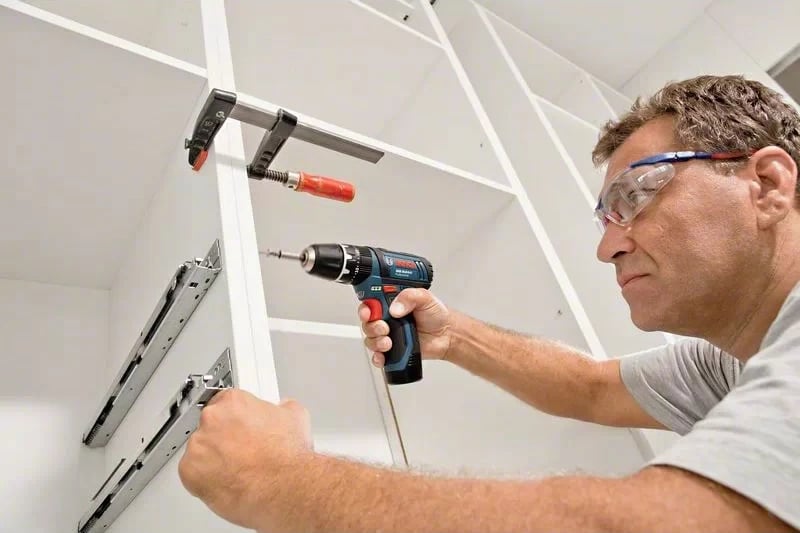 Pistoletë Bosch GSB 12V-15, brushless, 2x bateri 2Ah, 25 sfurqe, zi/kaltër
