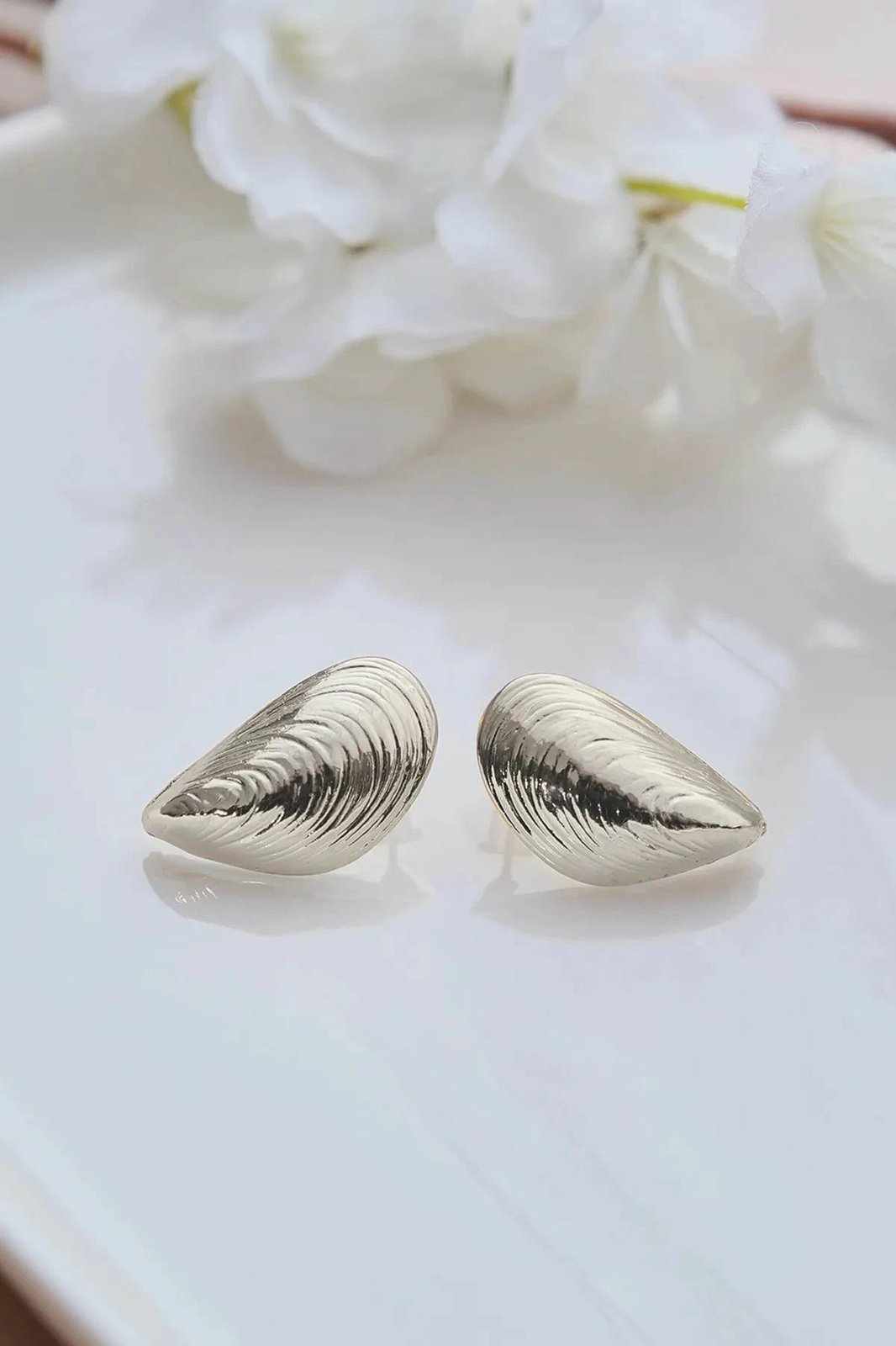 Vathë argjendi Jumeon, Gms-Dnzyldkp