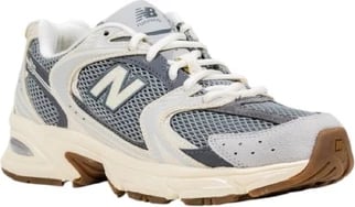 Atlete New Balance femra, gri Atlete New Balance femra, gri