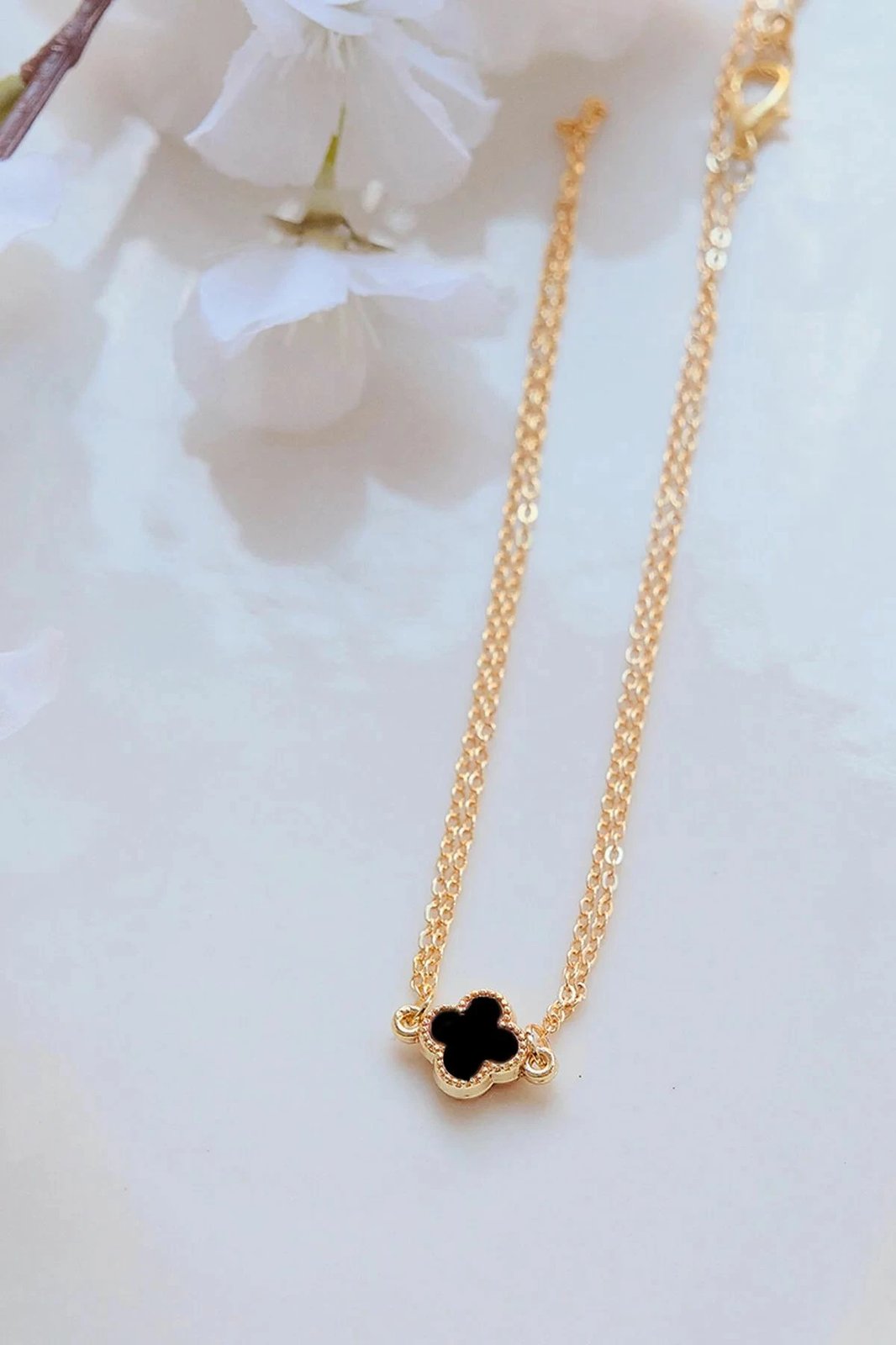 Byzylyk Jumeon, ngjyrë ari, gur zirkon