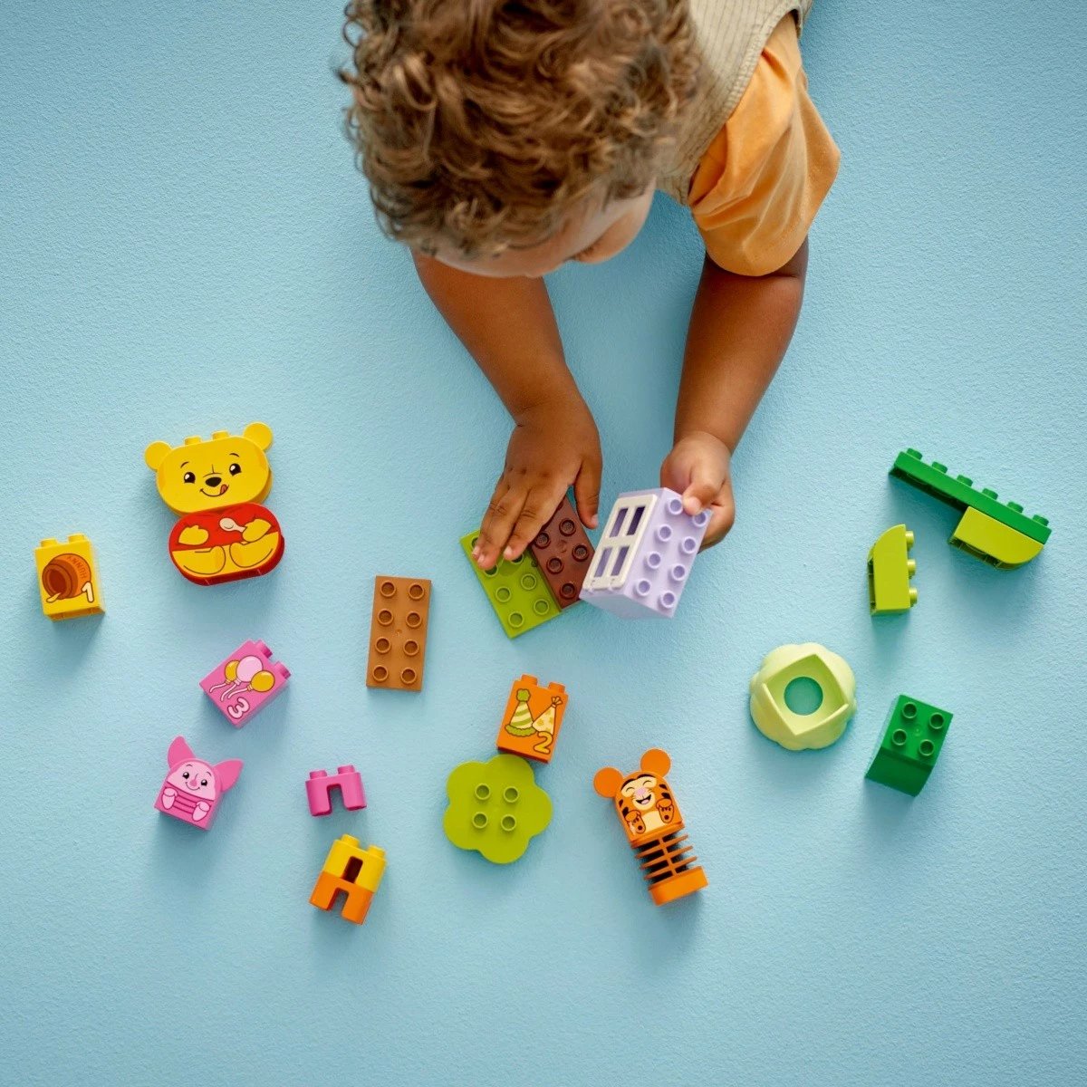 Set lodrash LEGO DUPLO Disney 10457 Winnie the Pooh's Birthday Party, 22 pjesë, plastikë, shumëngjyrëshe