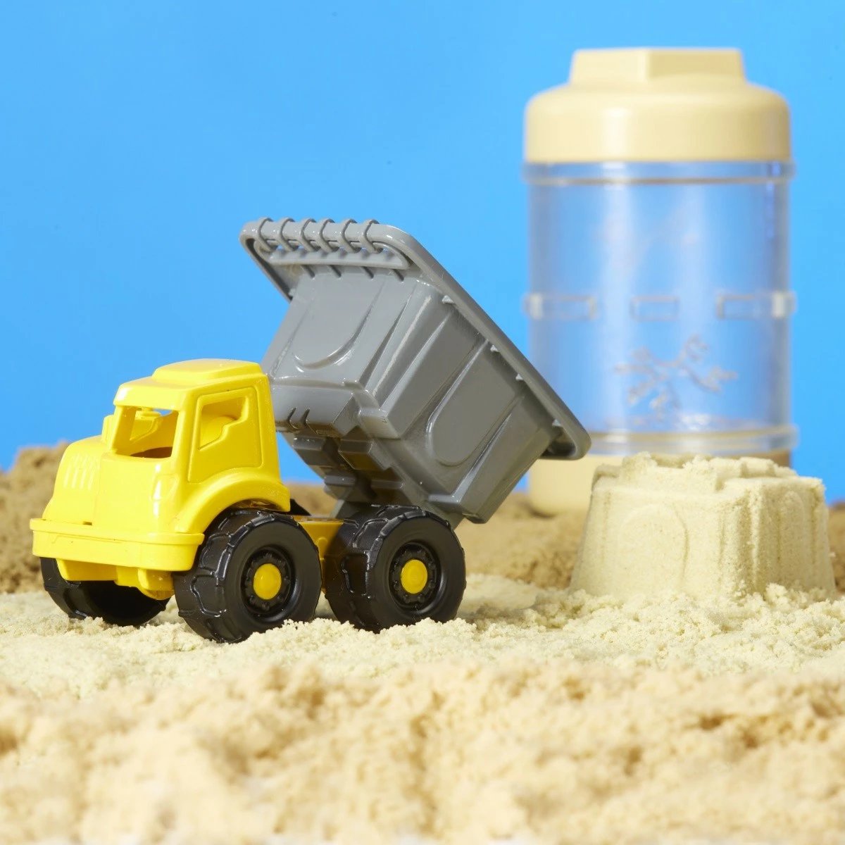 Set lodrash me rërë kinetike MGA Wonder Factory Never Dry Sand Trucks, Dumper Truck, plastikë