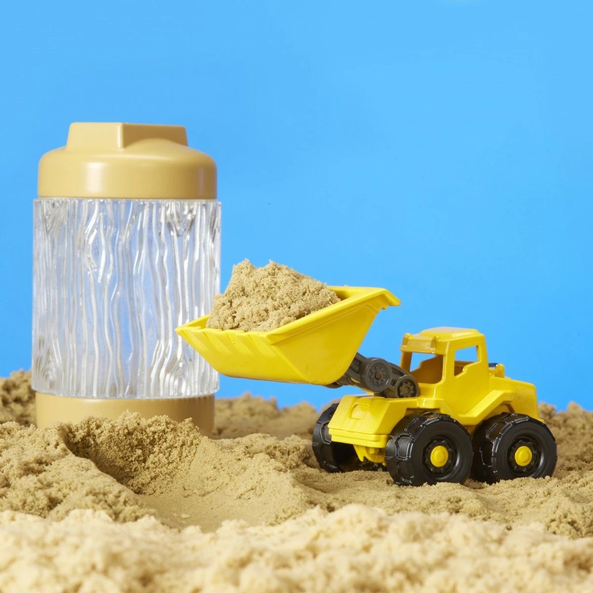 Set lodrash me rërë kinetike MGA Wonder Factory Never Dry Sand Trucks, ekskavator, plastikë
