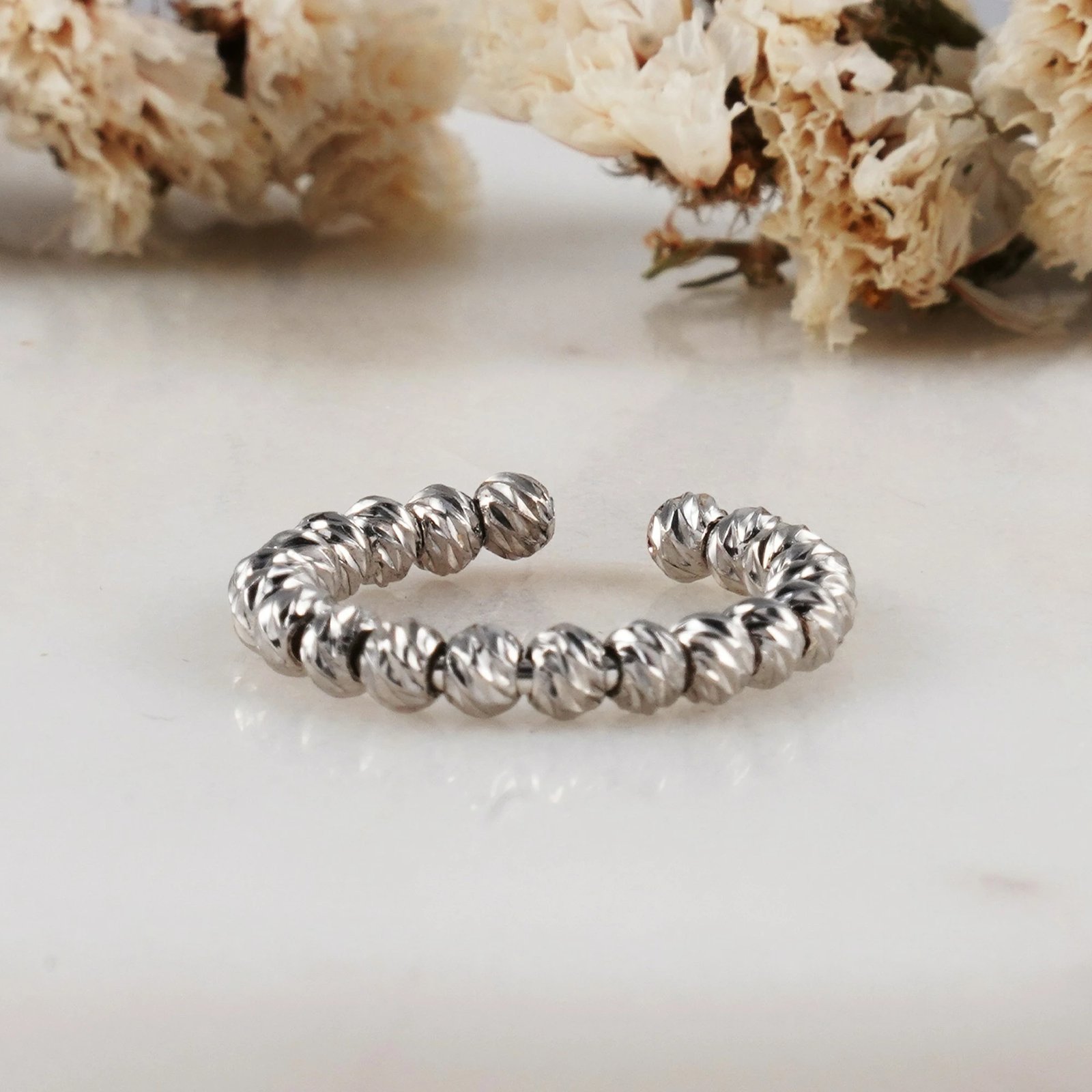 Unazë argjendi, Jumeon, 6412