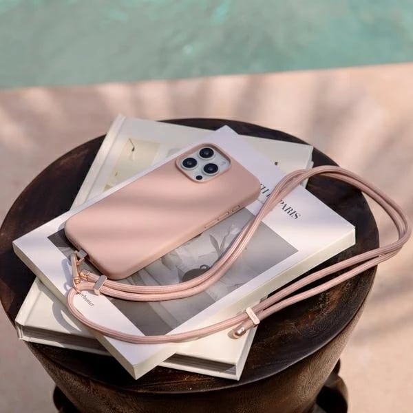 Mbështjellës UNIQ Coehl Creme Magnetic Charging për iPhone 16 Pro Max 6.9", me MagSafe, rozë, me rrip