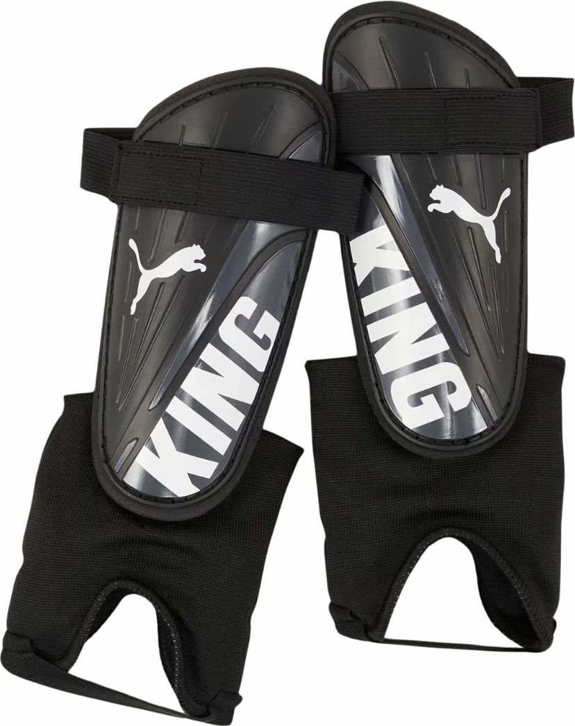 Mbrojtëse kërcini për futboll Puma unisex, të zeza