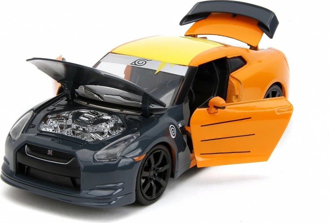 Makine lodër Jada Toys Naruto Shippuden Nissan GT-R 1:24 me figurë Naruto, portokalli/zezë Makine lodër Jada Toys Naruto Shippuden Nissan GT-R 1:24 me figurë Naruto, portokalli/zezë
