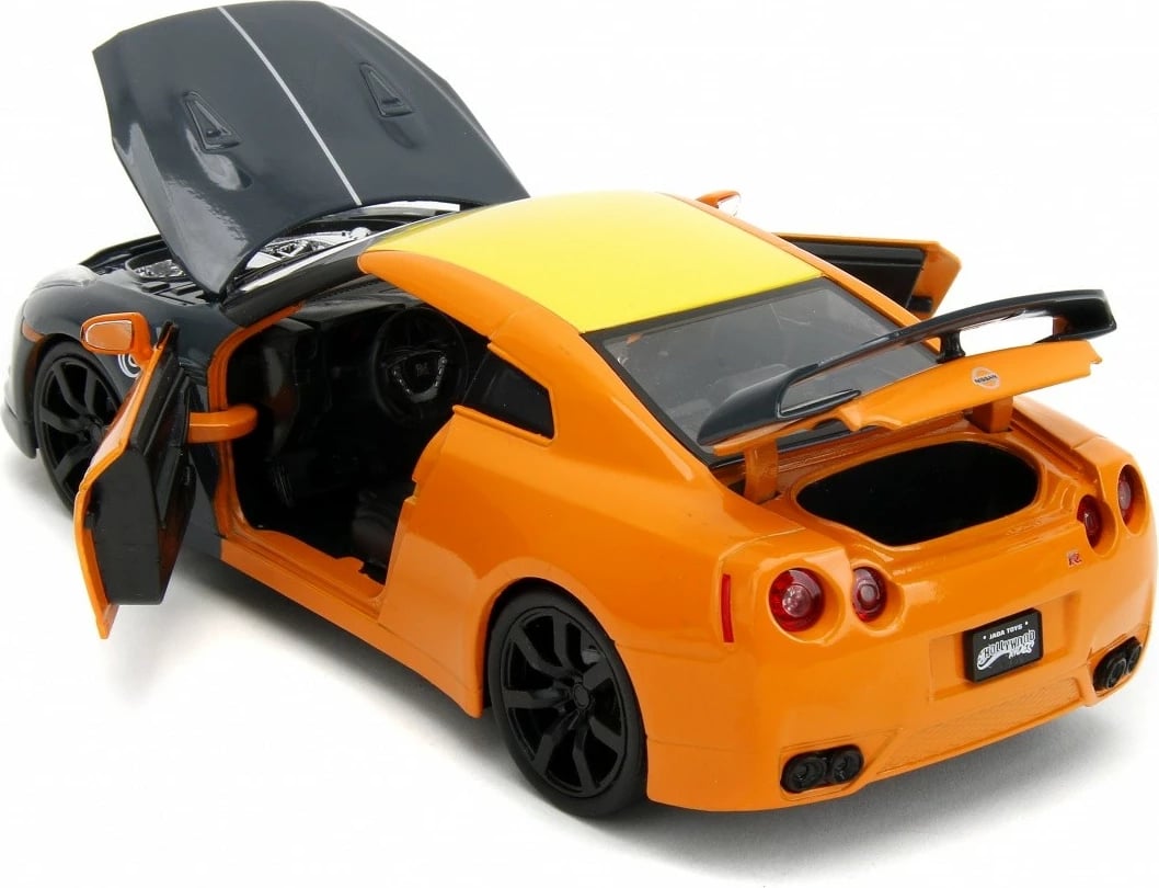 Makine lodër Jada Toys Naruto Shippuden Nissan GT-R 1:24 me figurë Naruto, portokalli/zezë Makine lodër Jada Toys Naruto Shippuden Nissan GT-R 1:24 me figurë Naruto, portokalli/zezë
