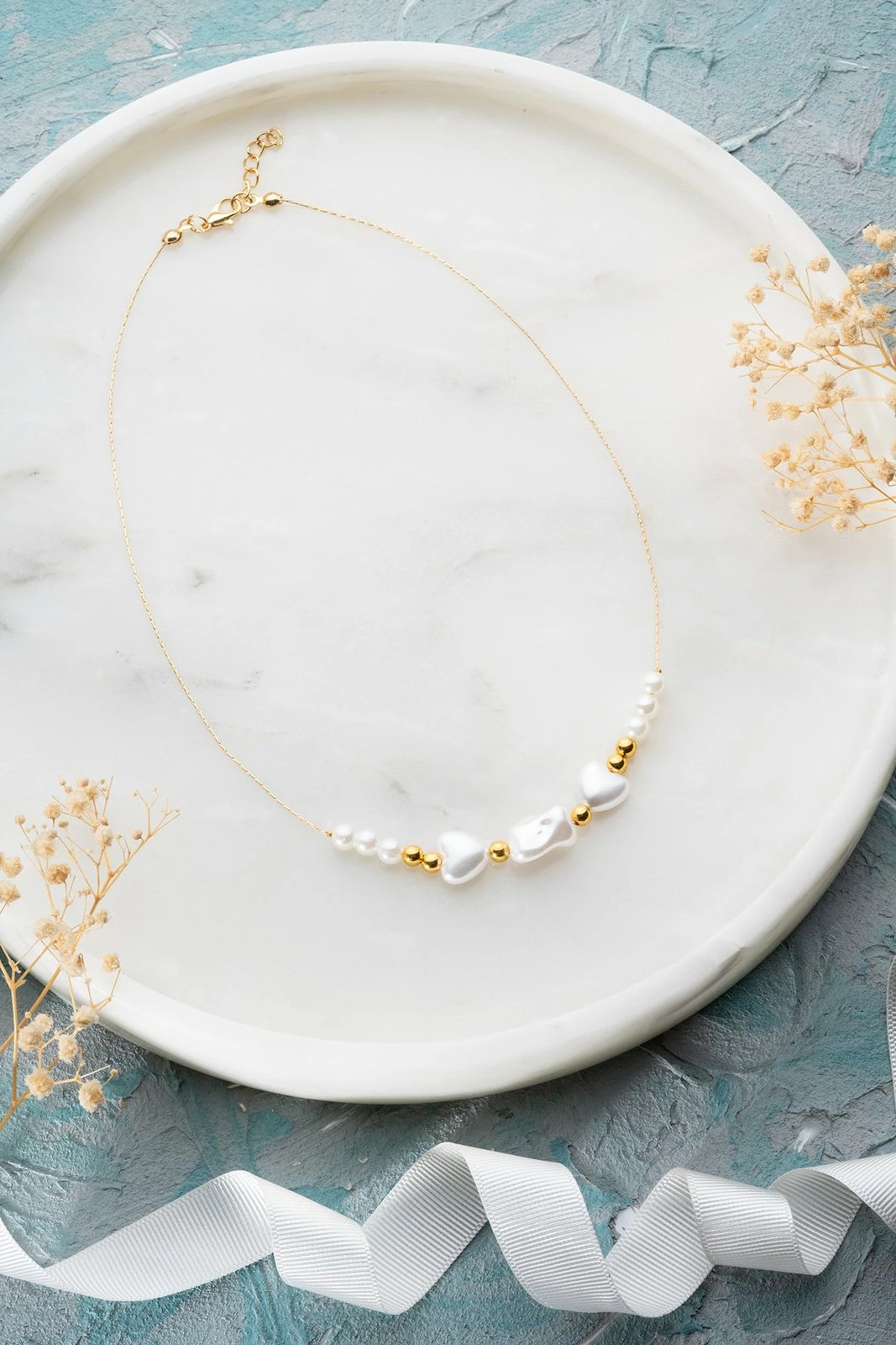 Varëse qafe Jumeon, B237701, ngjyrë ari dhe e bardhë