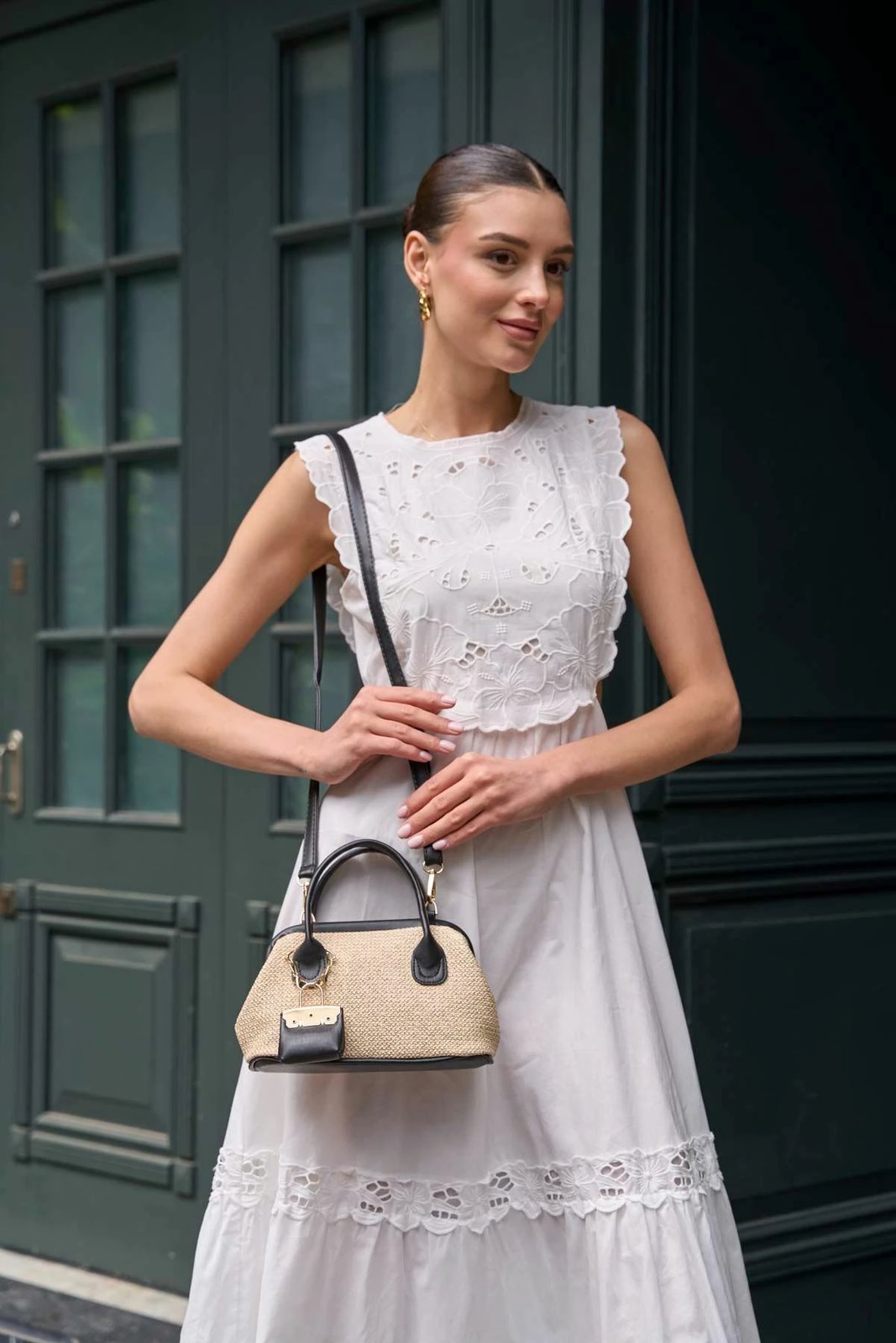 Çantë dore Zoozie, e zezë, MK1020225SM10-001