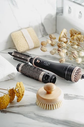 Stilues flokësh 2‑në‑1, Adler AD 2026, 1200W, 2 temperatura, goditje e ftohtë, 2 koka rrotulluese (21mm, 38mm), kabllo 1.8m, prizë C, e zezë/rozë e artë