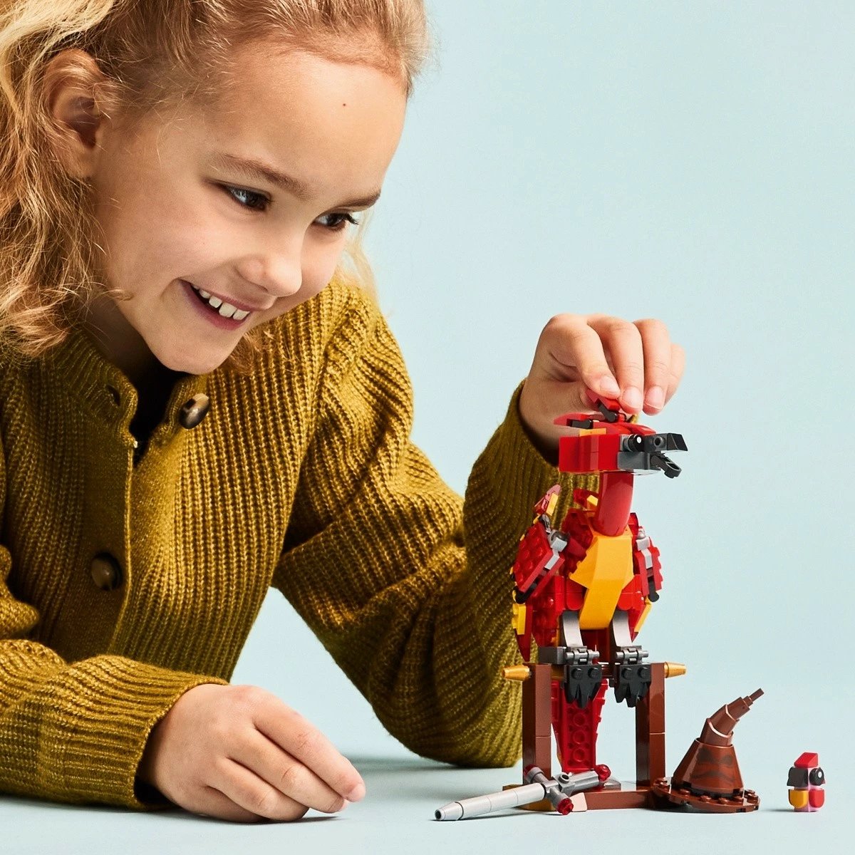 Set LEGO Harry Potter 76448 Fawkes: Feniksi i Dumbledore, 299 pjesë, për fëmijë 8+