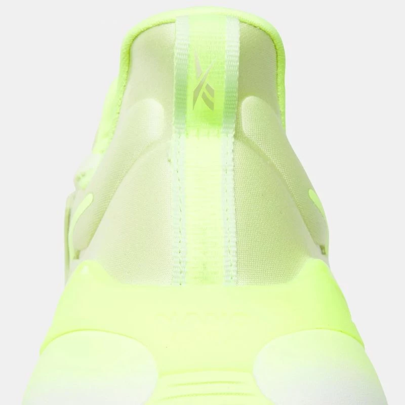 Atlete për femra Reebok, të verdha