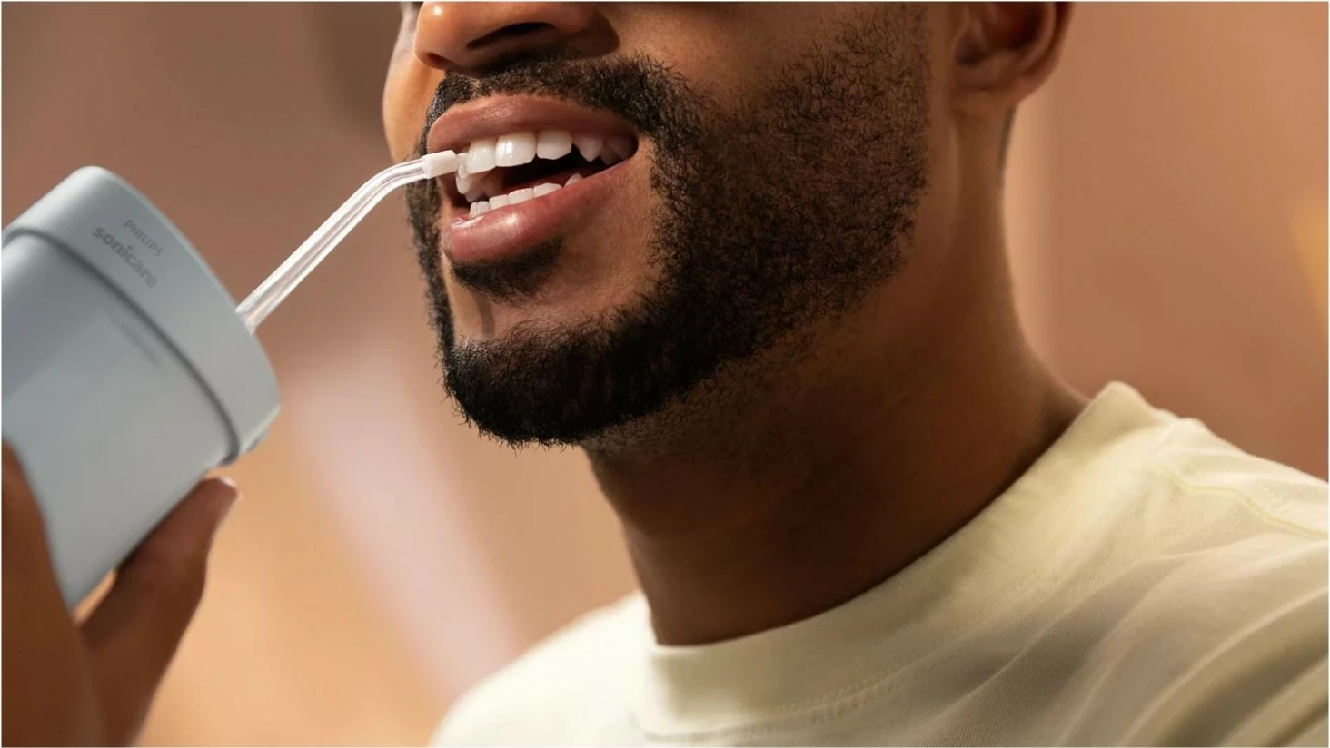 Irigator dhëmbësh Philips Sonicare Compact Flosser HX3333, 3 mënyra pastrimi, IPX7, aku, kaltër