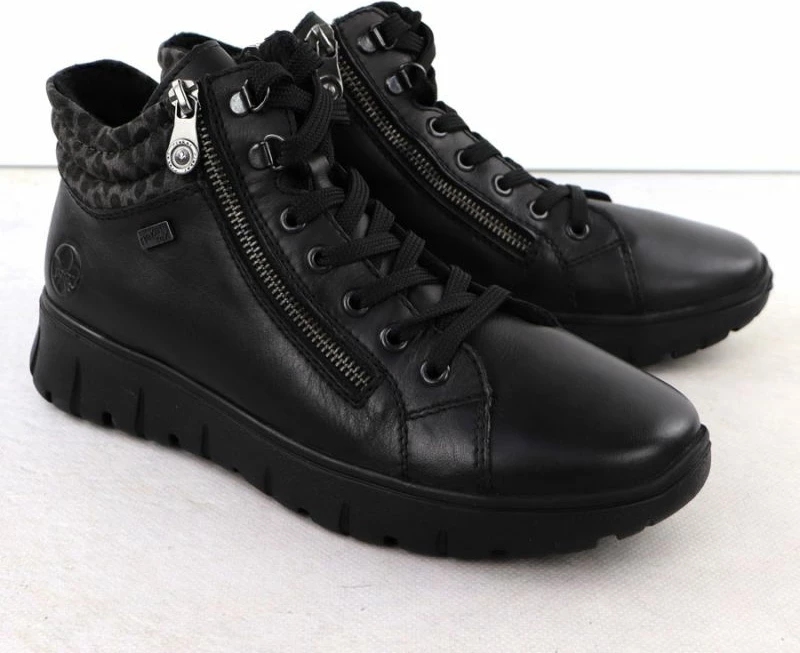 Çizme të shkurta lëkure për femra Rieker, të zeza