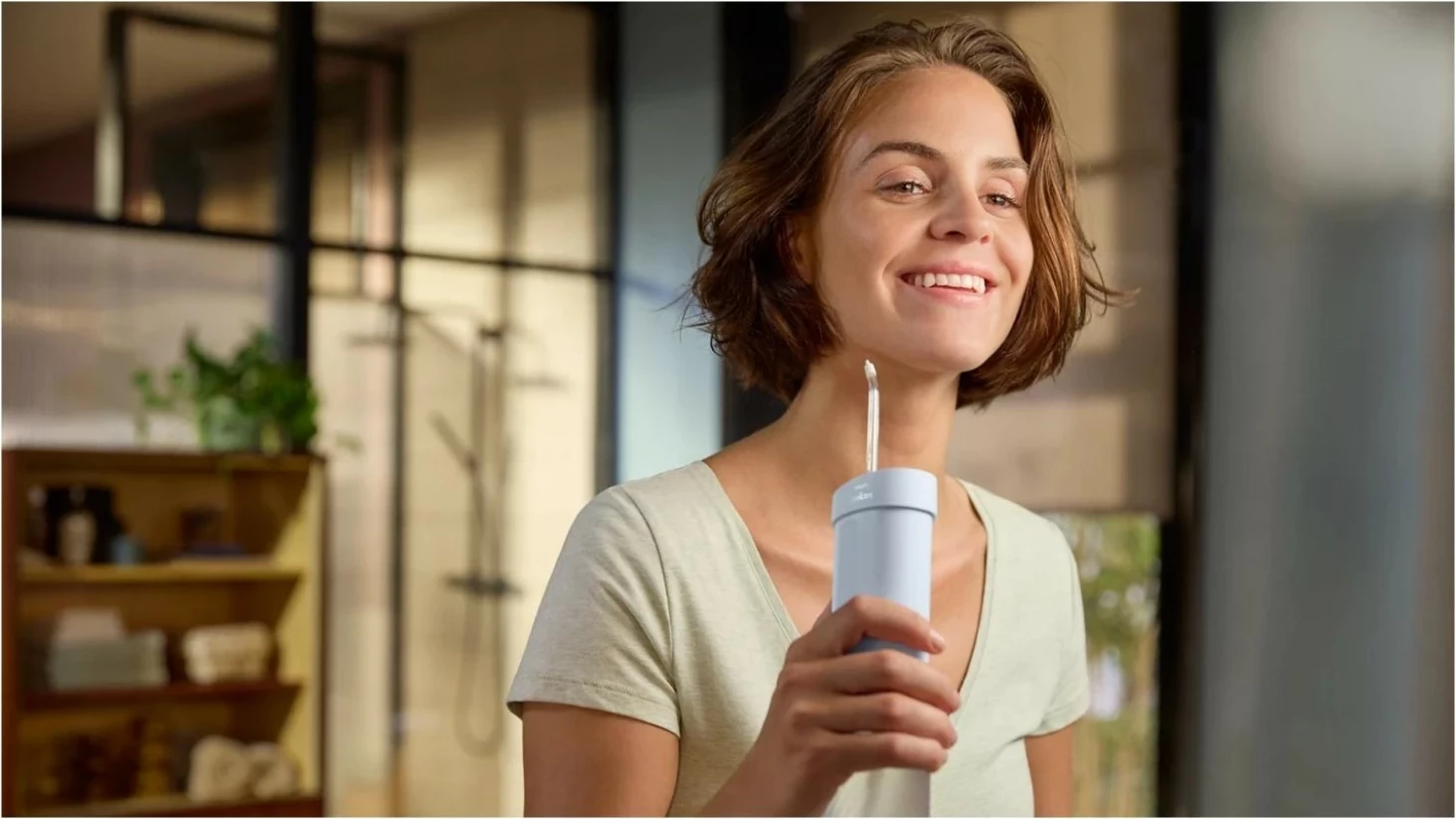 Irigator dhëmbësh Philips Sonicare Compact Flosser HX3333, 3 mënyra pastrimi, IPX7, aku, kaltër